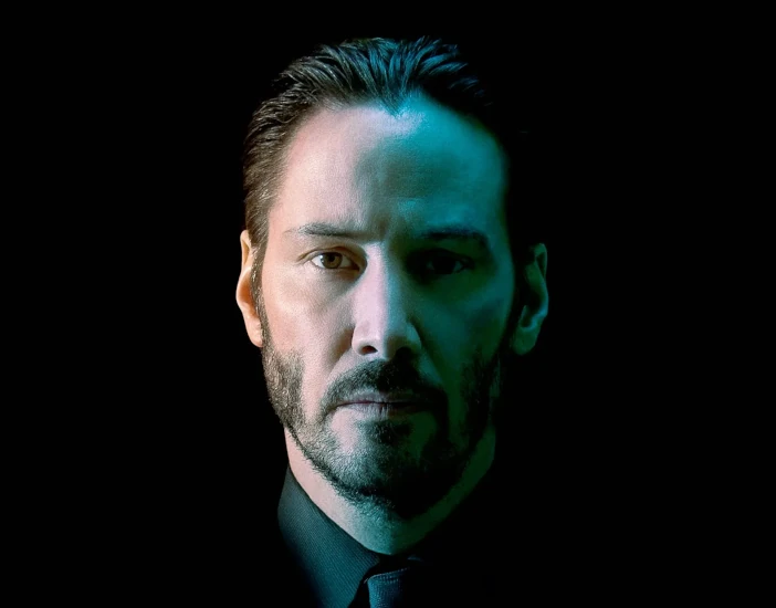 John Wick's Bulletproof Suit Makes the Series More Believable, Not Less